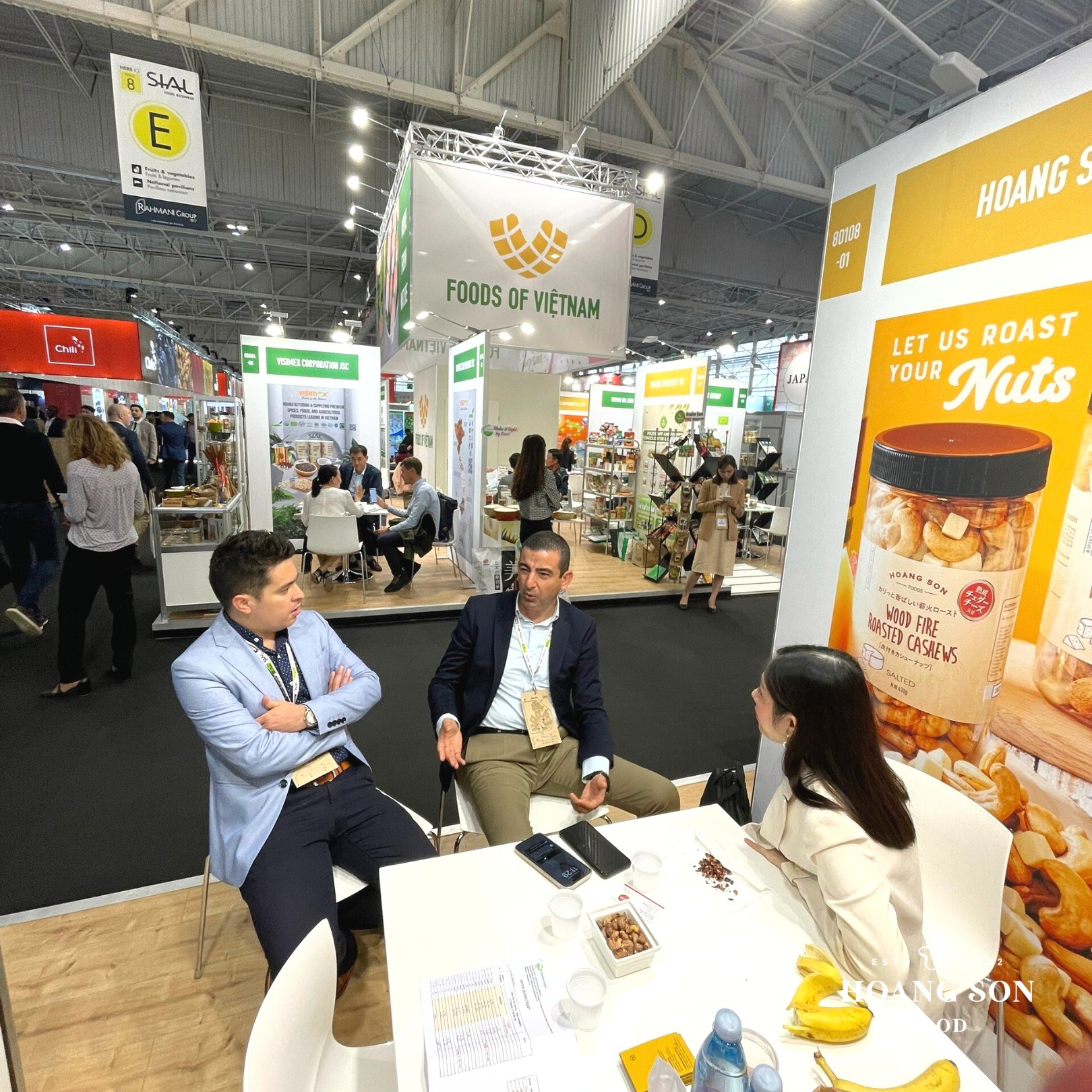 Customers visit Hoang Son Food's booth